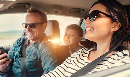 Family driving a car after getting a title loan