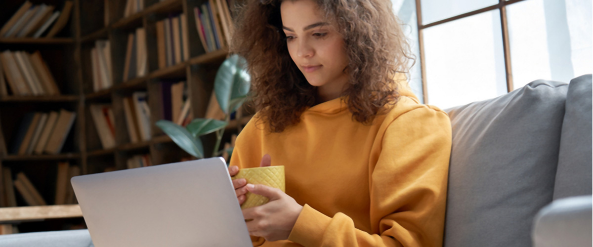 Woman looking at lines of credit online