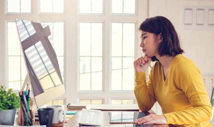 Woman looking at online loan options