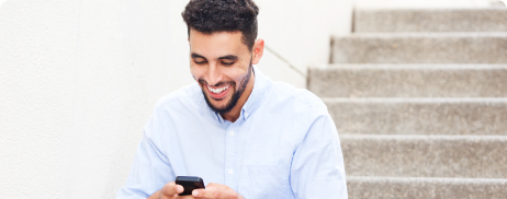 man looking at an alert on a mobile device