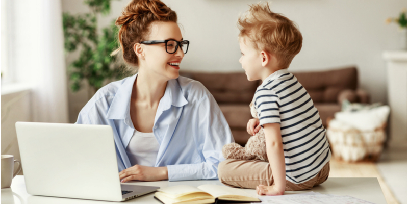 Women looking at computer with child