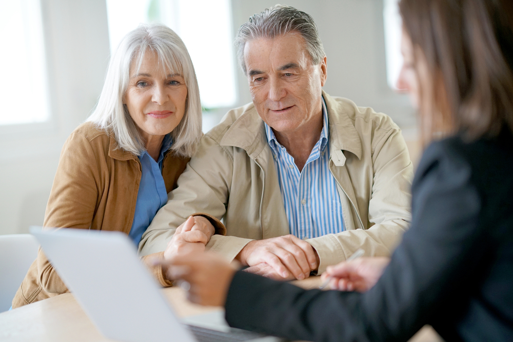 Senior couple meeting with financial advisor