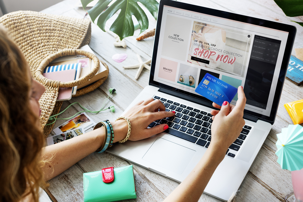 Woman shopping online with credit card