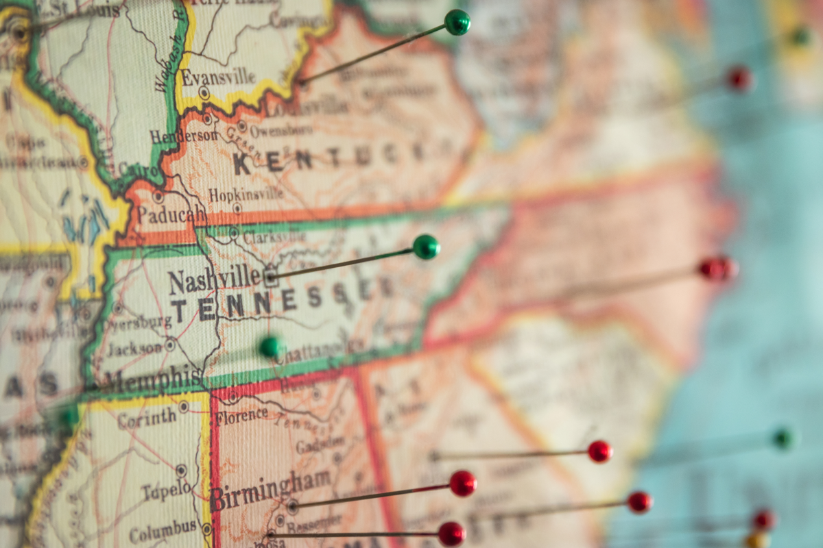 United States map with pins stuck in cities
