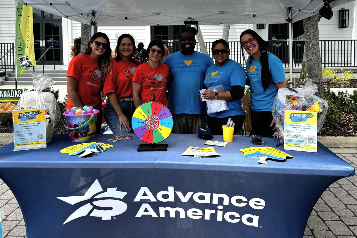Advance America employees at our booth