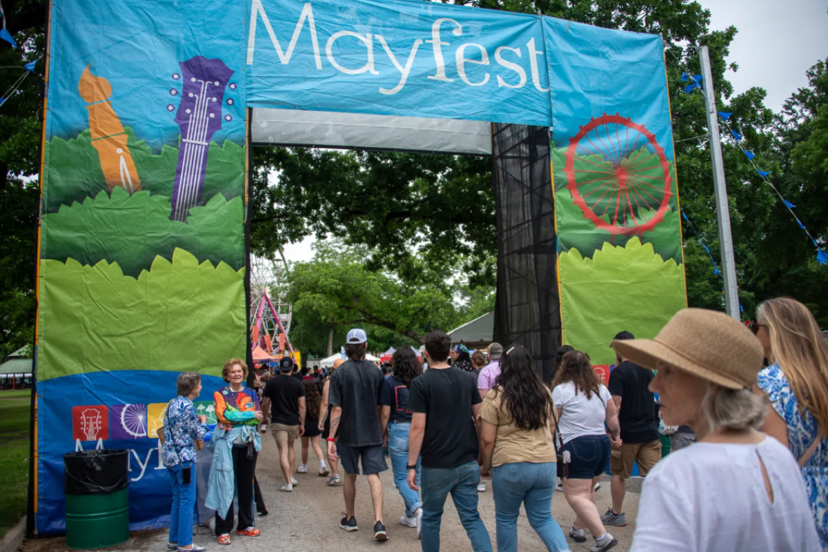 People walking into the Mayfest