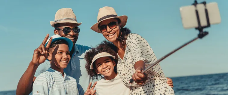 family on vacation taking a selfie