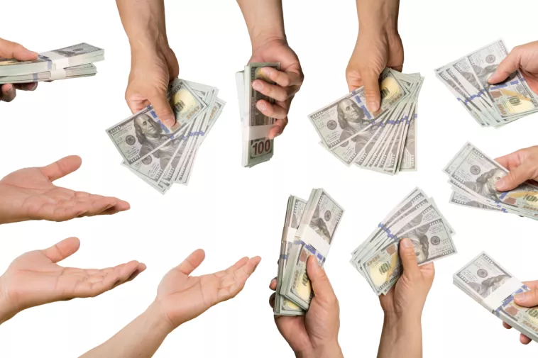 handing money