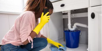 Women on phone in need of emergency loan