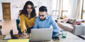 Couple researching revolving lines of credit
