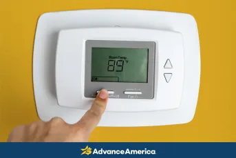 Air conditioning thermostat