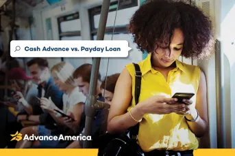 A woman in a yellow top uses her phone on public transit to look up the difference between a cash advance and a payday loan.
