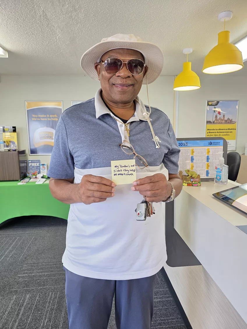 man holding card