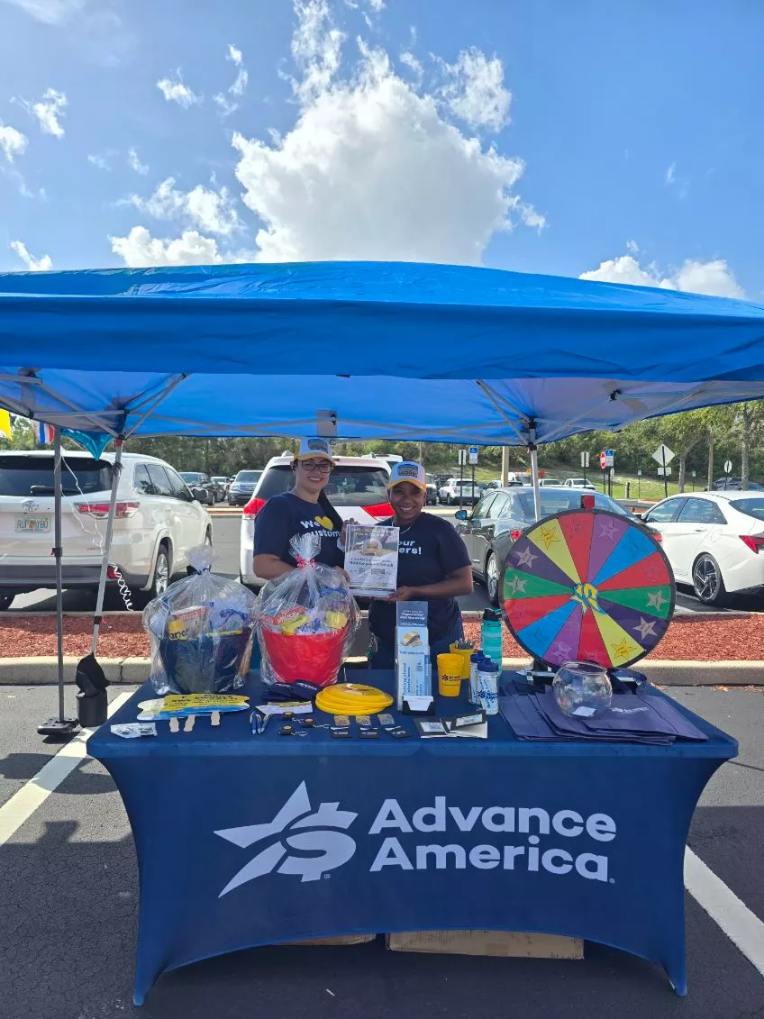 Advance America employees at our booth