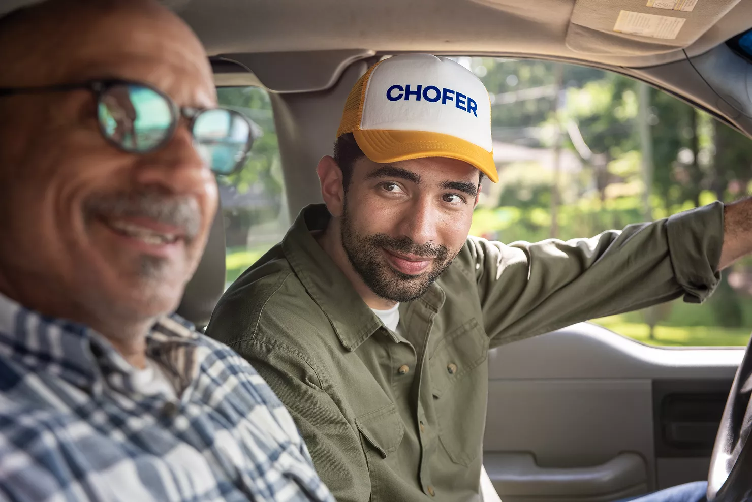 man driving his father